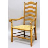 COTSWOLD SCHOOL CHAIR an oak ladderback back chair, with a woven triangular shaped seat and shaped