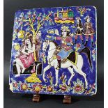 PERSIAN TILE, Qajar Style, cast in relief with a man on horseback and a semi-clad lady being