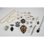 A QUANTITY OF JEWELLERY including two Scottish brooches, a 9ct. white gold band, with embossed