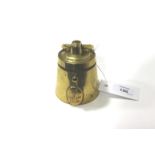 A BRASS NAVAL INKWELL. A 3" diameter circular base inkwell, standing 3.1/2" tall of tapering form. A