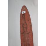 AN ABORIGINAL SHIELD. A carved wooden Aboriginal shield, measuring some 28.1/2" long by 5.3/4" wide.