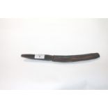 AN ABORIGINAL KNIFE. A carved bi-wood Aboriginal knife, with centre-rib and an overall length of