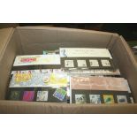 STAMP PACKS a box of Great Britain presentation packs, in 2 albums and loose 1984-2004. With