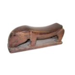 TRIBAL HEAD REST - PAPUA NEW GUINEA a hardwood head rest in the form of an animal. 32cms long