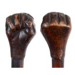 TRIBAL WALKING STICK - FIST possibly from the Pitcairn Islands, a hardwood walking stick with the