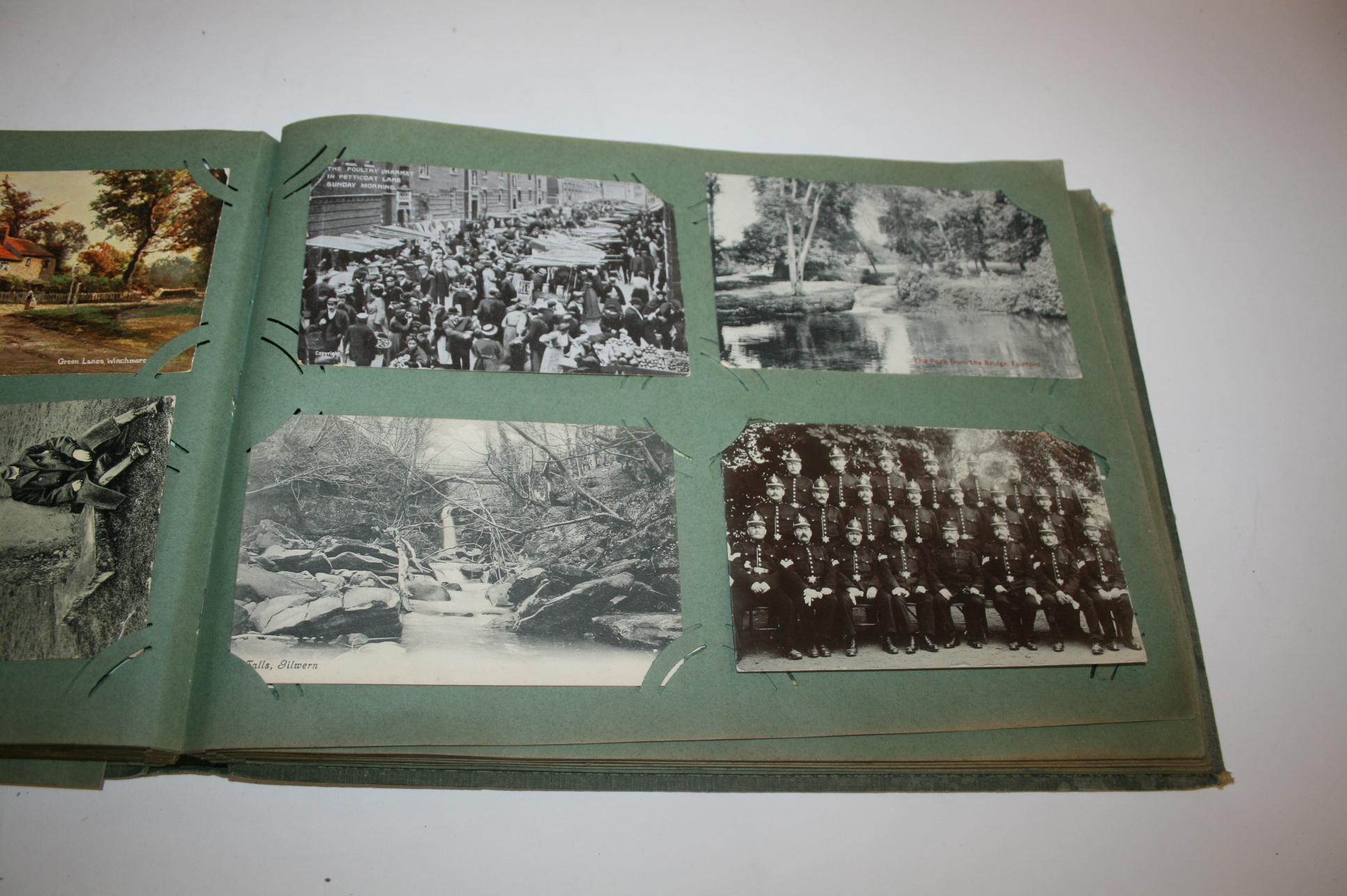 TWO POSTCARD ALBUMS including GB content (Aberystwyth, Dumfries, Bath, Yeovil (Sydney Gardens), W-