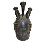 MENDE TRIBAL MARK - SIERRA LEONE a large African tribal mask, with faces on both sides and carved