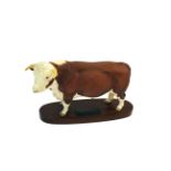 BESWICK HEREFORD BULL ON WOODEN PLINTH Model No A2542A Hereford Bull on wooden plinth, designed by