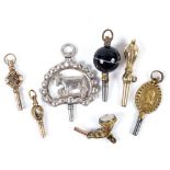 ANTIQUE WATCH KEYS - 19THC 7 various 19thc watch keys, including one with banded agate, one with Cow