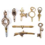 ANTIQUE WATCH KEYS 8 keys including one in the form of a Rifle, one set with cabochon turquoise, one