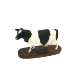 BESWICK FRESIAN COW ON WOODEN PLINTH Model No A2607 Fresian Cow on wooden plinth, designed by Graham