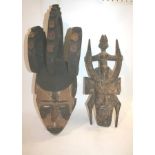 AFRICAN TRIBAL MASK - IGBO a carved Igbo Nigerian mask with pierced holes on each side, also with