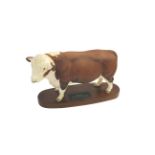 BESWICK HEREFORD BULL ON WOODEN PLINTH Model No A2574 Polled Hereford Bull on wooden plinth,