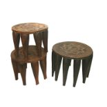 THREE AFRICAN CARVED TRIBAL STOOLS - NUPE three similar carved tribal stools, each with a star