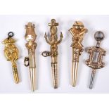 ANTIQUE WATCH KEYS 5 decorative base metal watch keys, including one with an Anchor motif. (5)