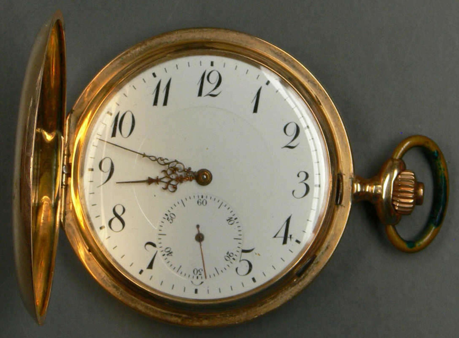 14 ct goldene Taschenuhr, beide Außendeckel 14 ct gepunzt. Innendeckel Metall. Gewicht: ca. 106 g.