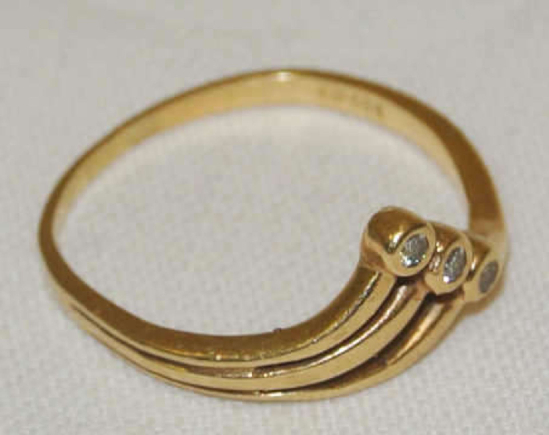 Damenring, 585er Gelbgold, besetzt mit 3 Zirkonia, Ringgröße 56, Gewicht ca. 2,2 gr Ladies ring,