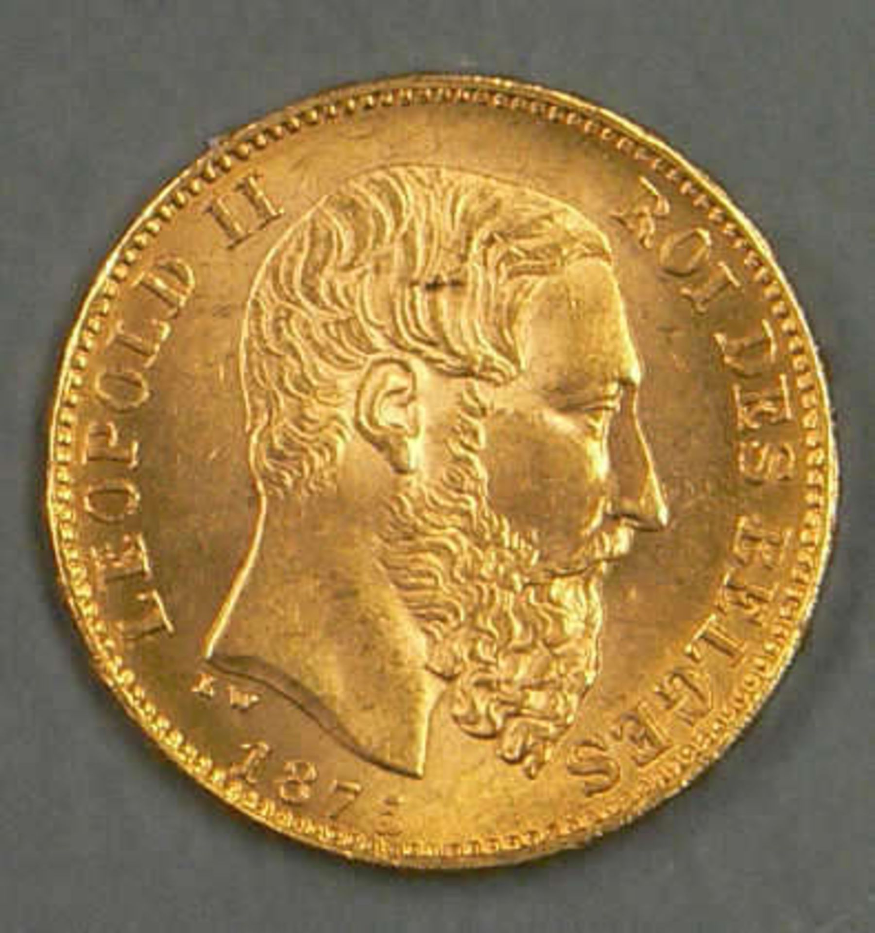 Belgien 1875, 20.- Francs - Goldmünze "Leopold II.". 900er Gold. Gewicht: 6,47 g. Erhaltung: vz.