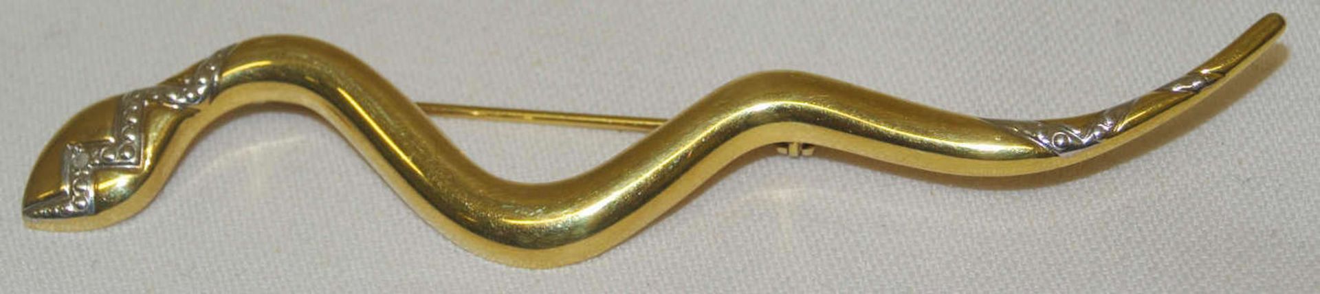 1 Brosche in Form einer Schlange, 585er Gelbgold, Länge ca. 9,4 cm Gewicht ca. 4,1 gr. 1 brooch in