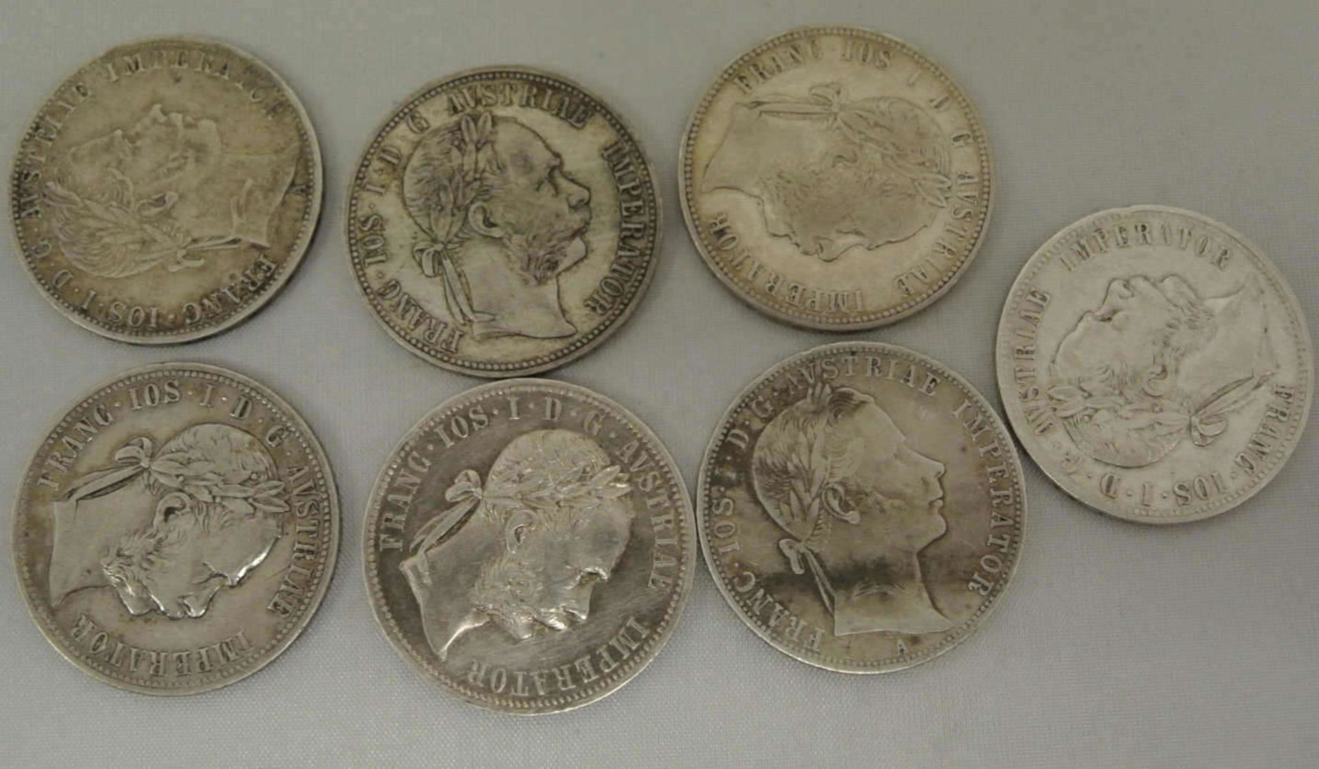 Lot Münzen Österreich, 1 Florin/Gulden insgesamt 7 Stück, dabei 1x 1860, 1x 1861, 2x 1878, 1x 1886