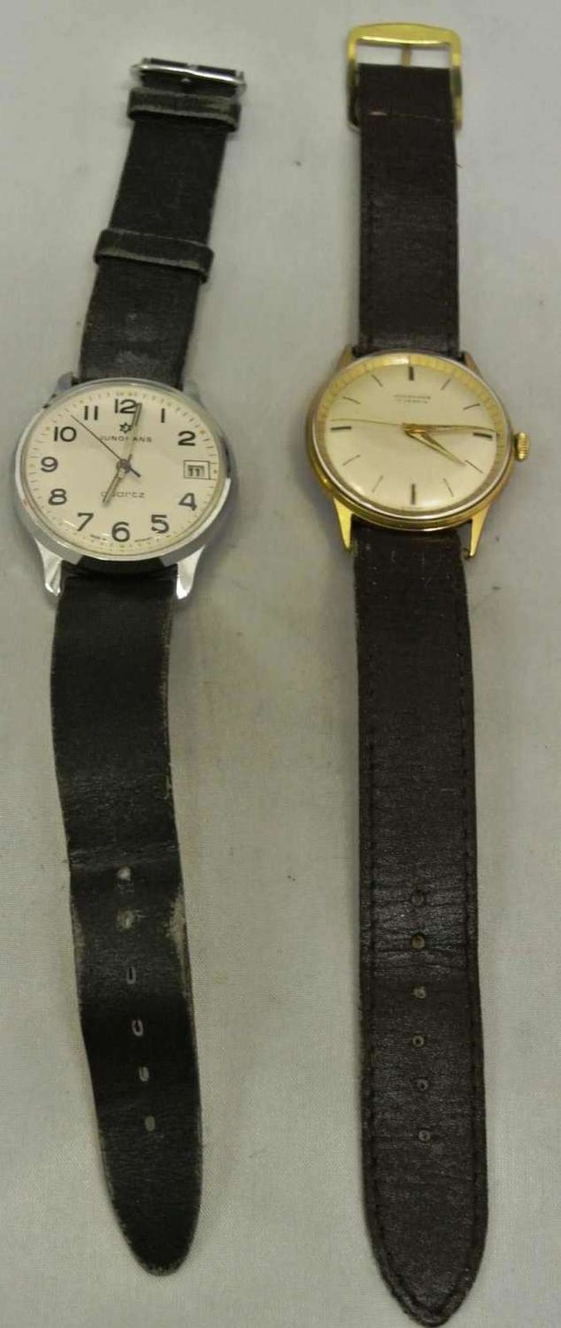 2 Junghans Herrenarmbanduhren, 1x mechanisch, sowie 1x Quartz. Beide recht guter Zustand.