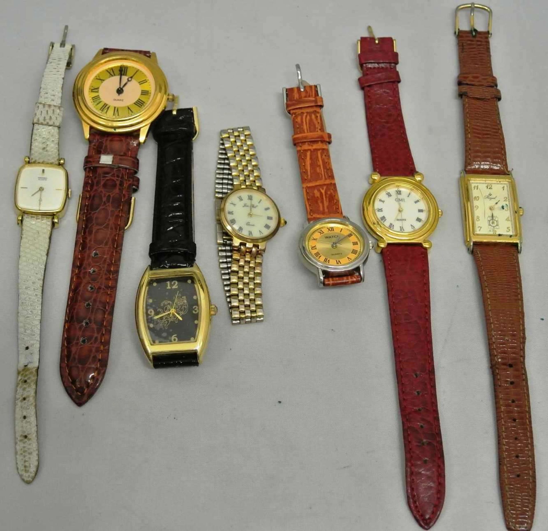 Lot von 7 Damen - Quartz Uhren, dabei z.B. Jean Paul, Seiko, etc.