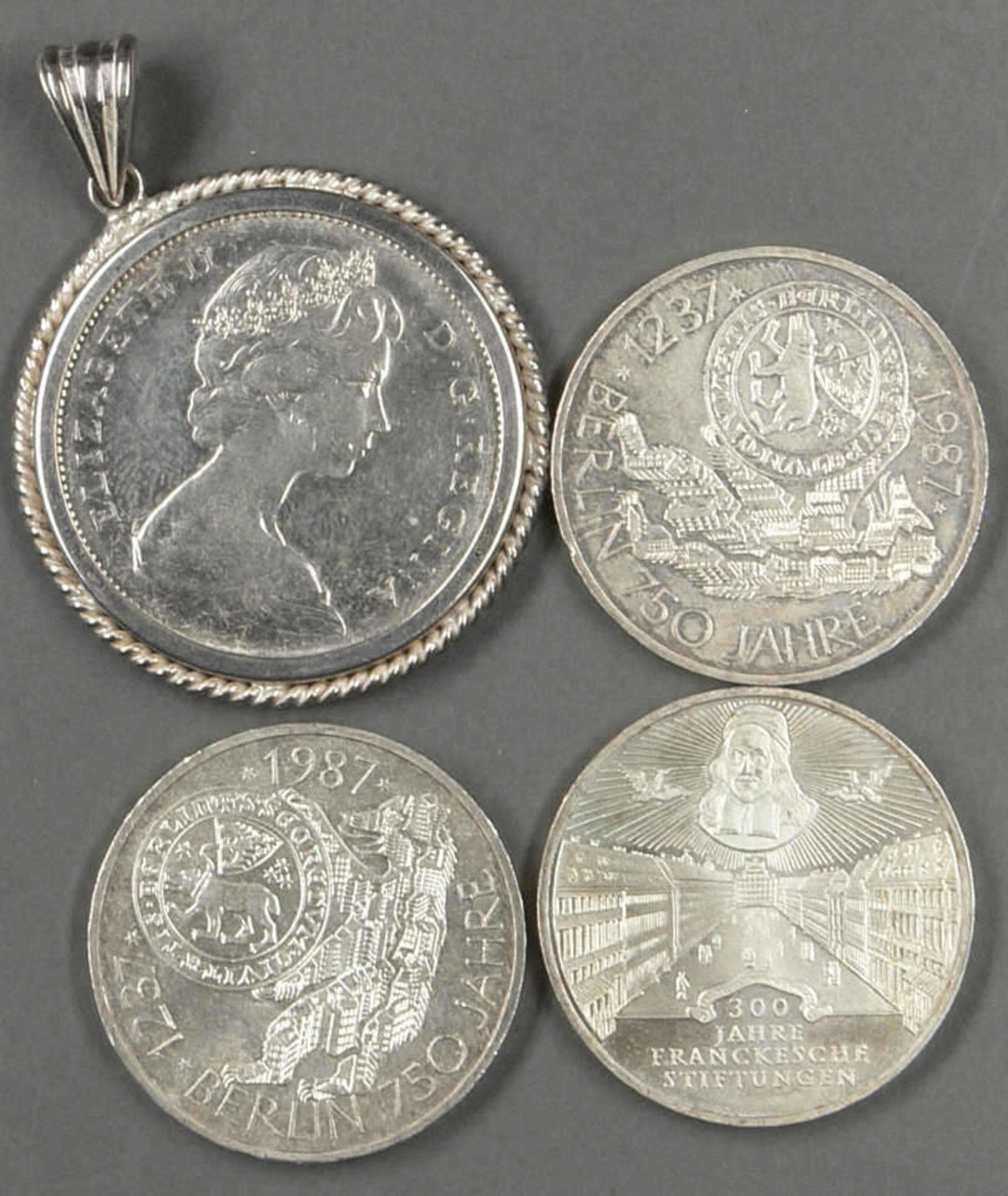 Kleines Münzlot, bestehend aus 3 x 10.- DM - Münzen, sowie 1 x Kanada - Dollar von 1966, mit