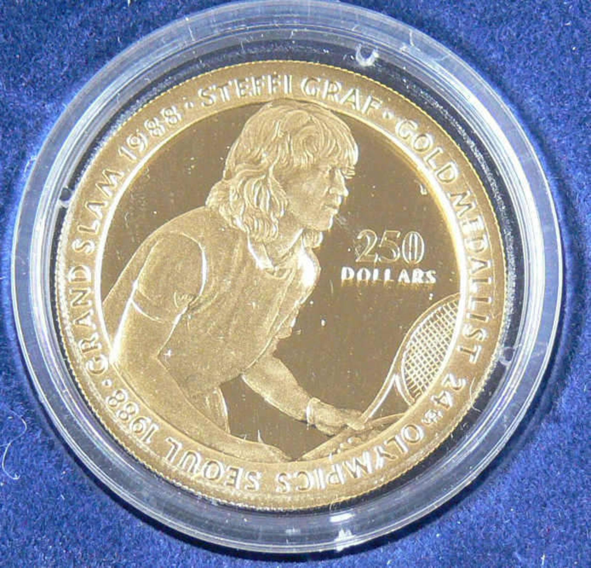 Niue 1989, 250 Dollar - Goldmünze "Steffi Graf". Gold 916,6, Gewicht: ca. 10,4 g. Durchmesser: 27