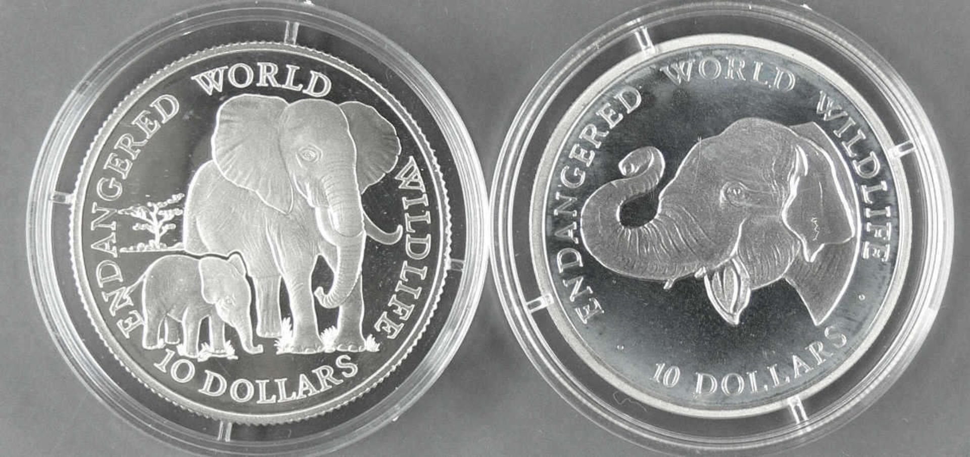 Cook Islands 1990, zwei 10.- Dollars - Silbermünzen, ""Elefant mit Junges" und "Elefant einzeln".
