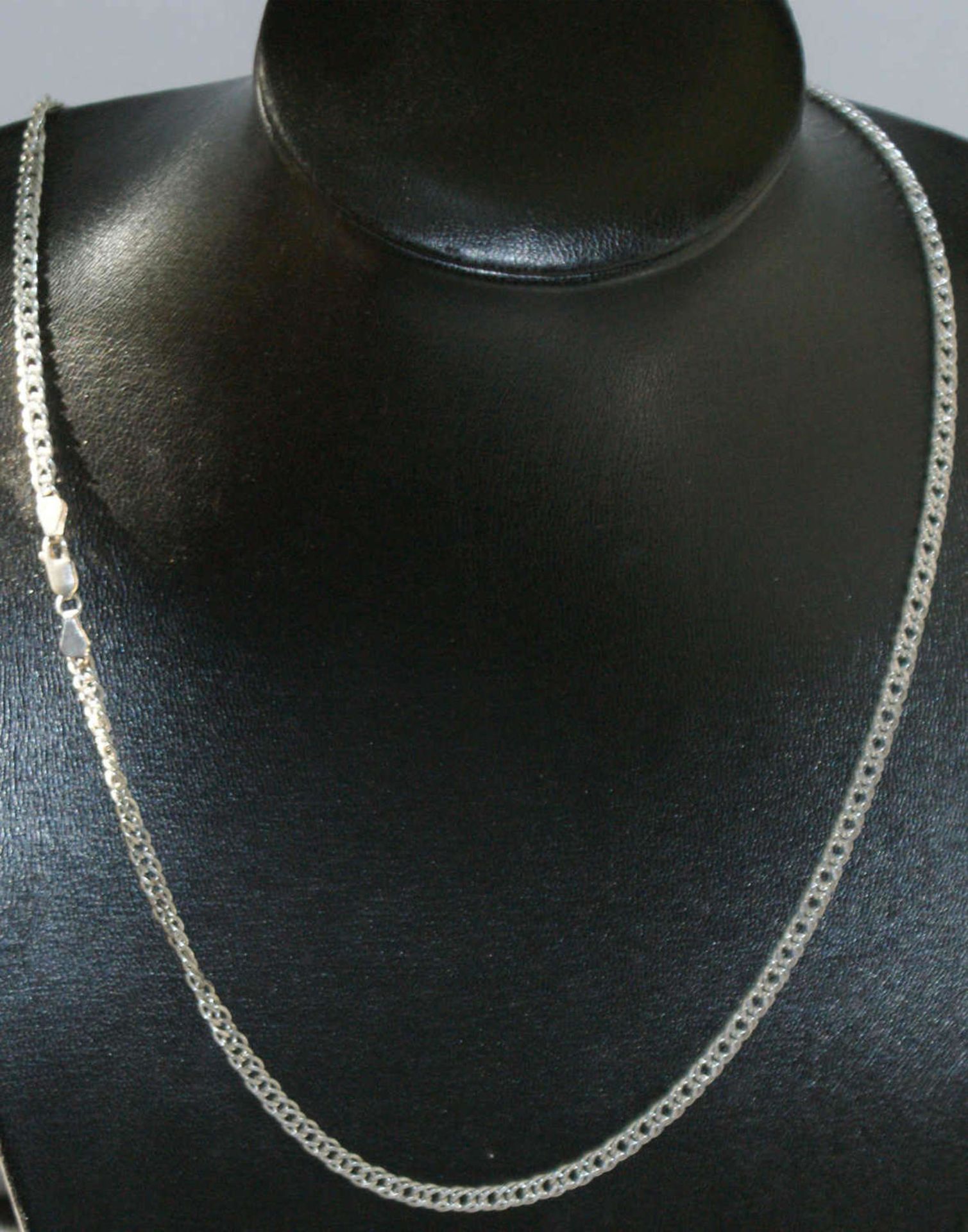 Schmuckset, 925er Silber, bestehend aus 1 Kette, Länge ca. 44 cm, sowie 1 Armband ca. 19 cm. Gewicht