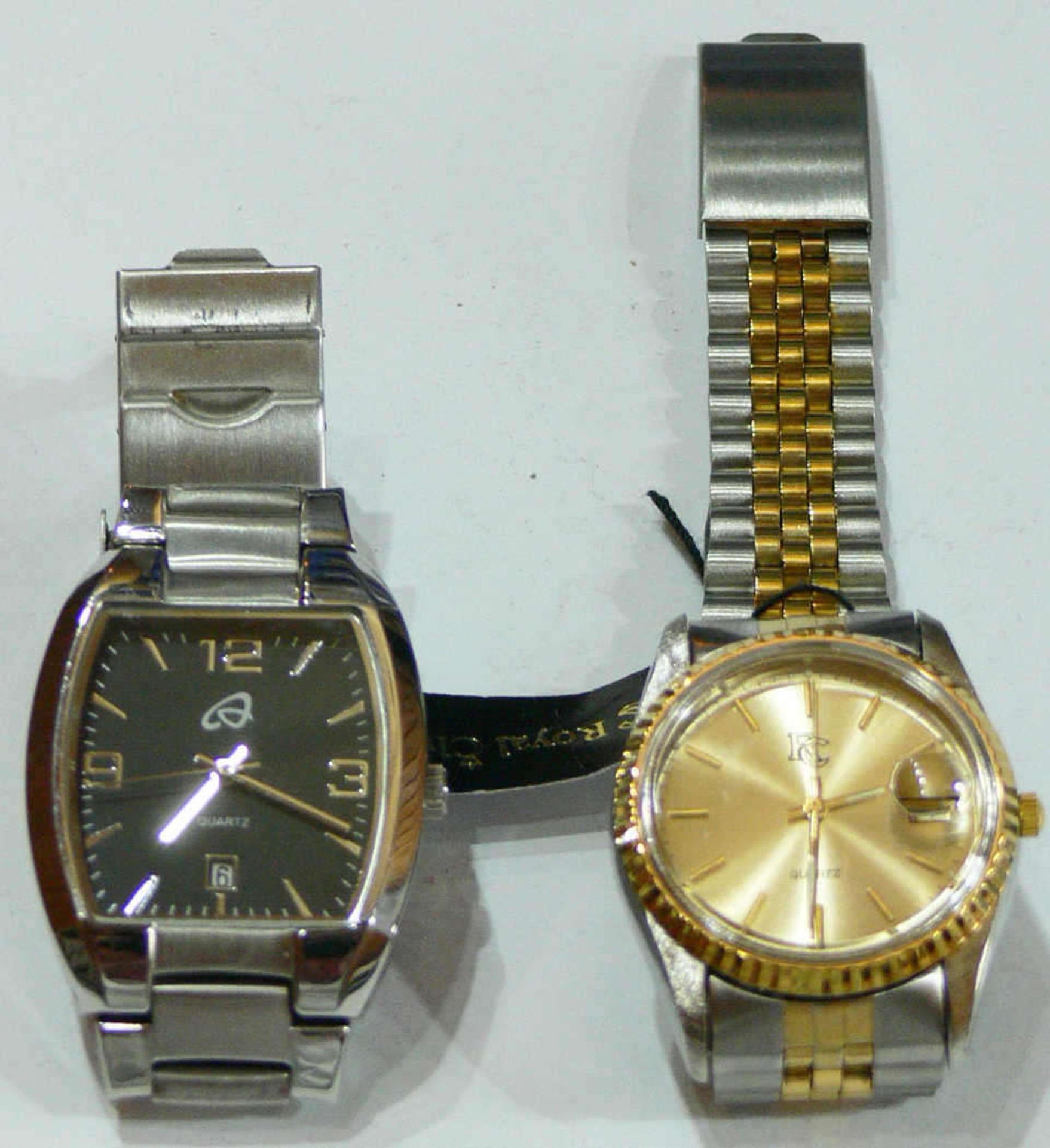Zwei Herren - Armbanduhren, Quarz, 1 x Royal Club, Bicolor - Metallarmband, goldenes Ziffernblatt,