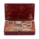 A Victorian Silver Needlework Compendium Width of case 5 inches.