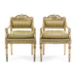 A Pair of Continental Giltwood Armchairs Height 35 inches.