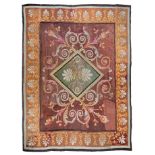 An Aubusson Wool Rug 12 feet 3 inches x 8 feet 10 inches.