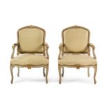 A Pair of Louis XV Style Painted and Parcel Gilt Fauteuils Height 38 1/4 inches.