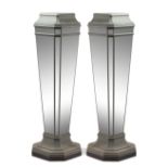 A Pair of Neoclassical Style Painted and Mirrored Pedestals Height 50 1/2 inches.