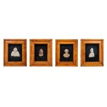 A Group of Four English Wax Busts Height 8 x width 6 5/8 inches (framed).