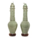 A Pair of Chinese Celadon Glazed Pottery Funerary Urns Height of tallest 32 1/8 inches.