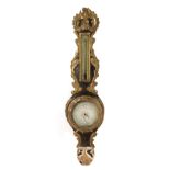 A French Ebonized and Parcel Gilt Barometer Height 38 1/2 inches.