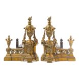 A Pair of Louis XVI Style Brass Chenets Height 13 1/2 inches.