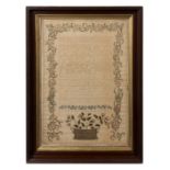 A Needlepoint Sampler 30 1/2 x 29 1/2 inches (framed).