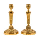 A Pair of Continental Gilt Metal Candlesticks Height 11 inches.