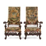 A Pair of Baroque Walnut Armchairs Height 47 1/2 inches.