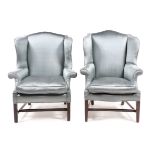 A Near Pair of Chippendale Mahogany Wing Chairs Height of first 47 inches.