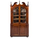 A Chippendale Mahogany Corner Cabinet Height 94 x width 49 x depth 21 inches.