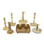 A Collection of Brass Candlesticks Height of tallest 8 1/2 inches.