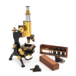 An English Brass and Black Lacquered Microscope Height 12 inches.