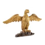 A Carved Giltwood Eagle Height 15 1/2 x width 26 inches.