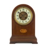 A Regency Style Mahogany Mantel Clock Height 12 inches.