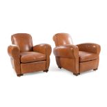 A Pair of Leather Upholstered Club Chairs Height 35 3/4 inches.